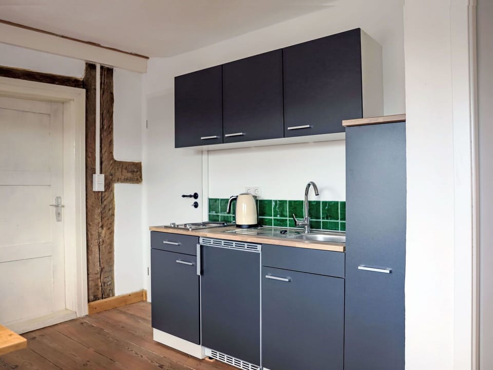 Kitchen, Cabinetry, Countertop, Major Appliance, Interior Design, Kitchen Appliance, Flooring, Kitchen Sink, Cupboard, Tap
