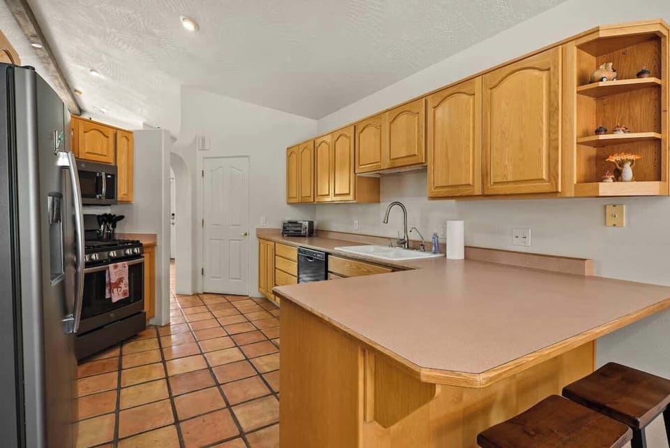 Ample counter space in the kitchen for meal prep.