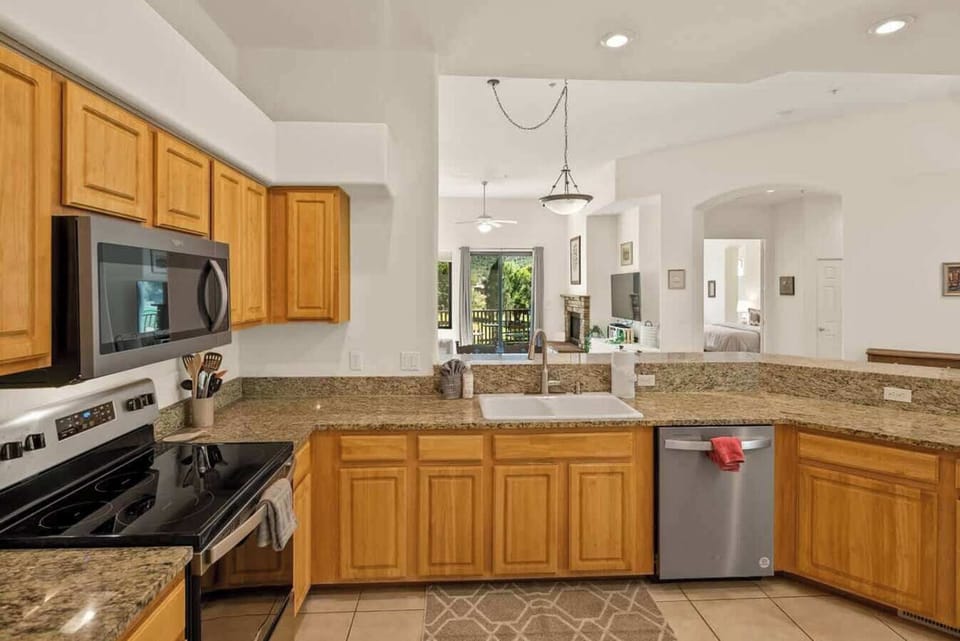 Fully loaded kitchen with plenty of light and space.