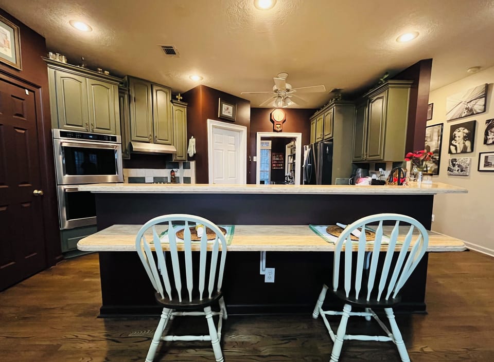 Upper-level full equipped kitchen. 