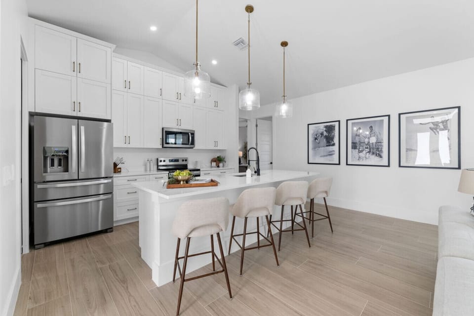 Fully stocked kitchen with seating for everyone and room to cook together