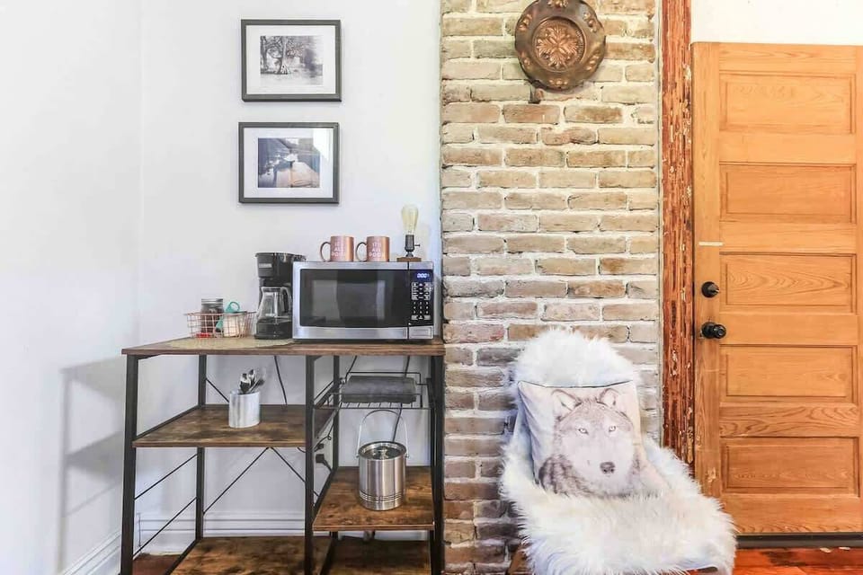 Fully stocked coffee bar, local coffee, sugar, creamer and breakfast bars. Water glasses, wine glasses, dishes and silverware are also provided.