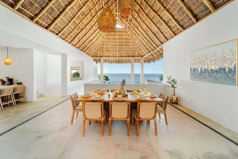 Dining room looking towards pool deck and ocean