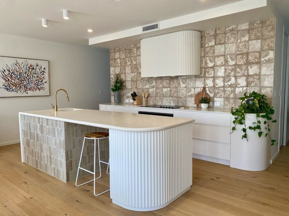 Designer kitchen the centrepiece of entertainment to the dining and lounge.