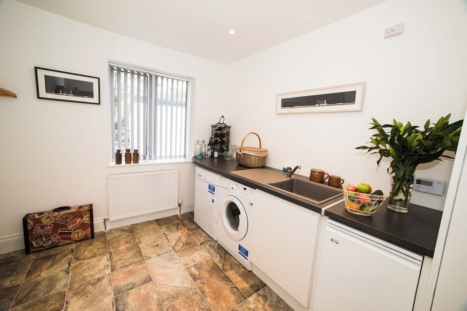 Utility Room with Washing Machine & Tumble Dryer.