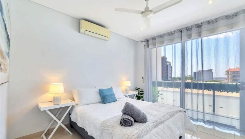 Main bedroom with sliding door opening to balcony