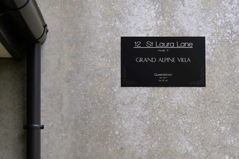 Grand Alpine Villa signage – your Queenstown retreat begins here