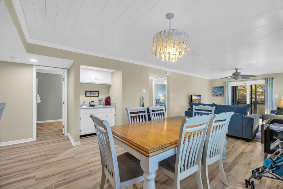 The dining area comfortably seats six, making it ideal for family dinners.