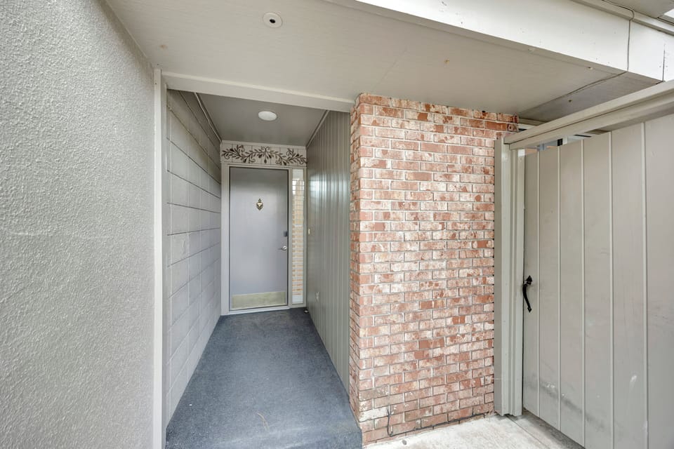Please note a street facing security camera is present in the entryway.