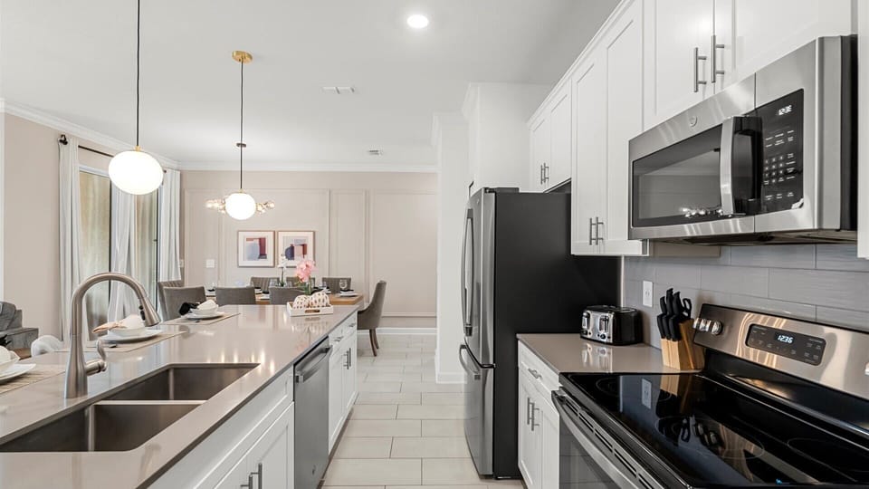 Fully equipped modern chef's kitchen with modern appliances