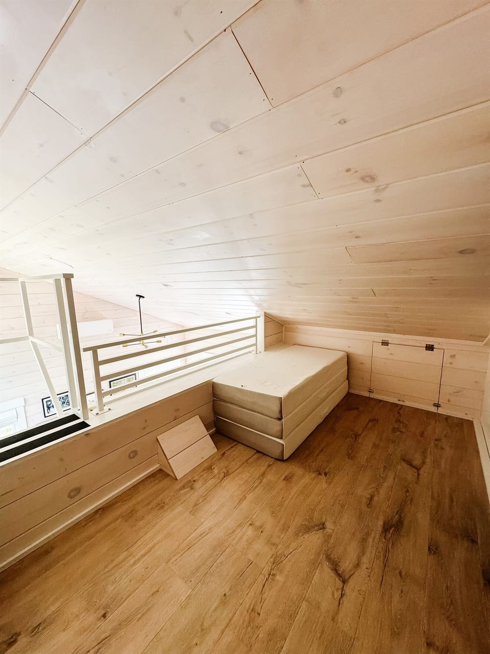 Loft area with trifold queen mattress