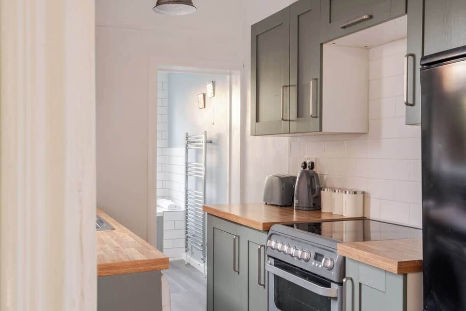 Bright, modern, and fully stocked – the kitchen is ready for whatever you’re craving