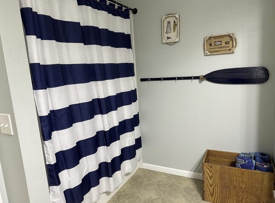 Main floor bath with tub and shower