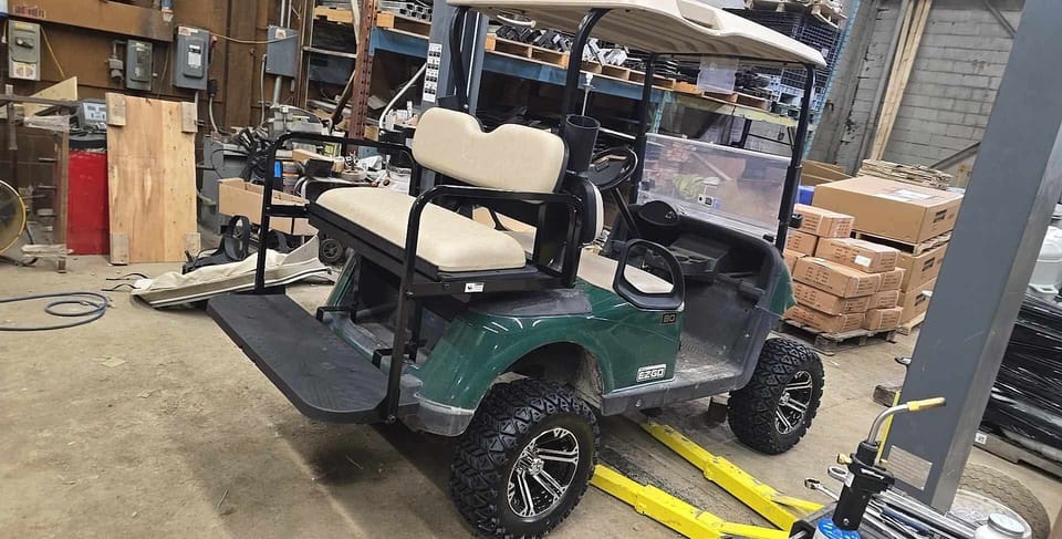 Lifted golf cart included in rental. Must be 18 and have valid drivers license
