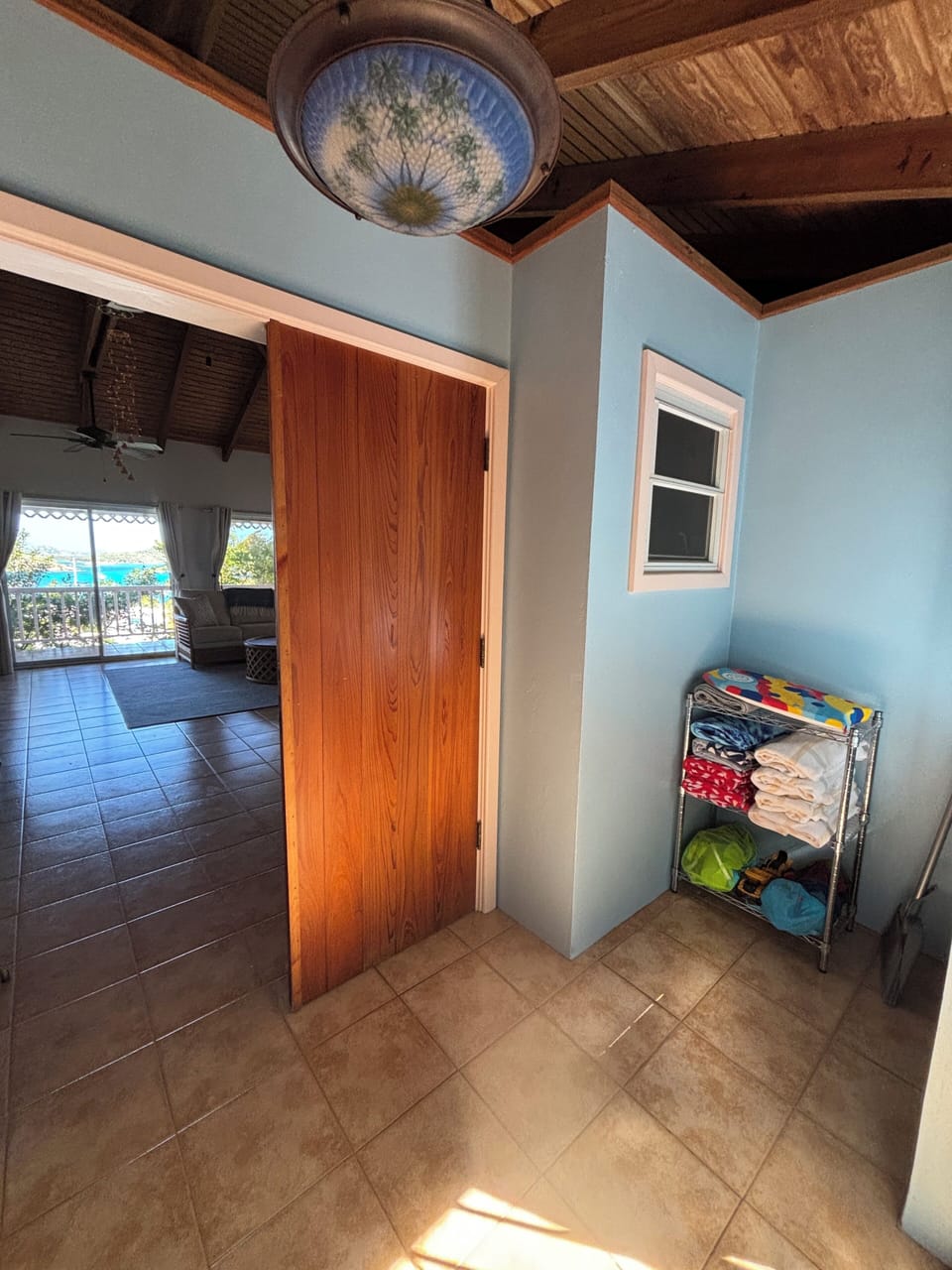 Entry way with beach towels/toys/etc.