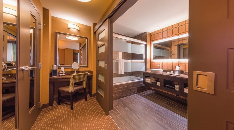 Refresh easily with bright vanity, tub-shower, and ample space.