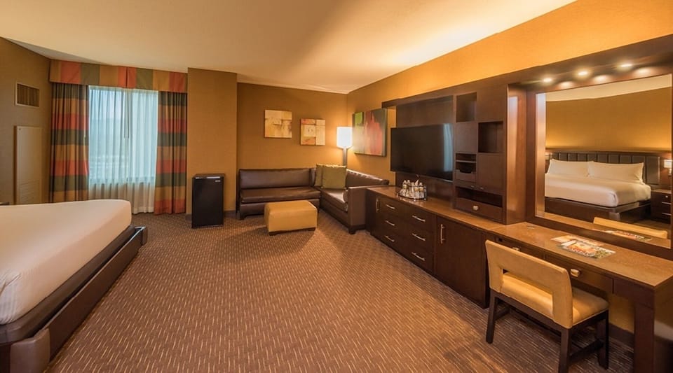 Stretch out in a spacious suite with cozy lounge seating.