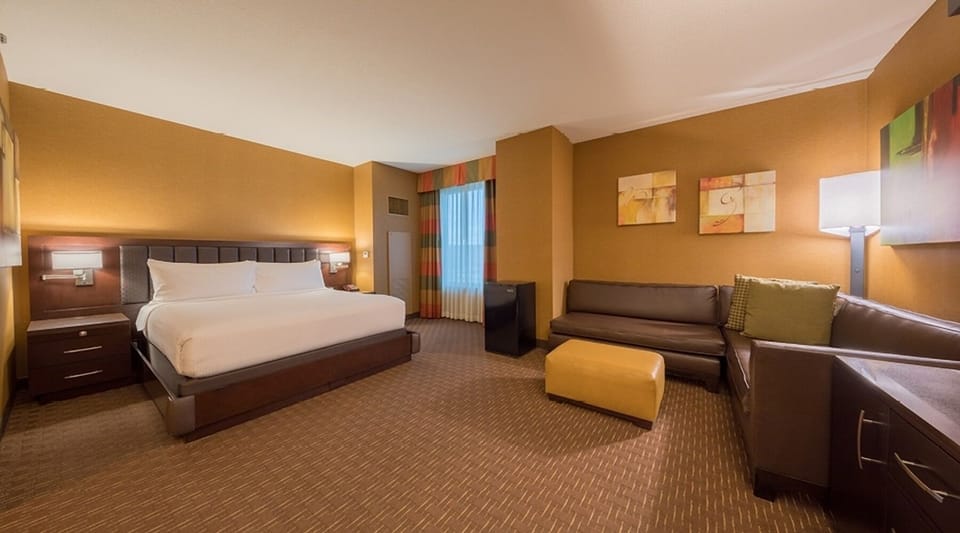 Lounge comfortably in an oversized suite with plush seating.