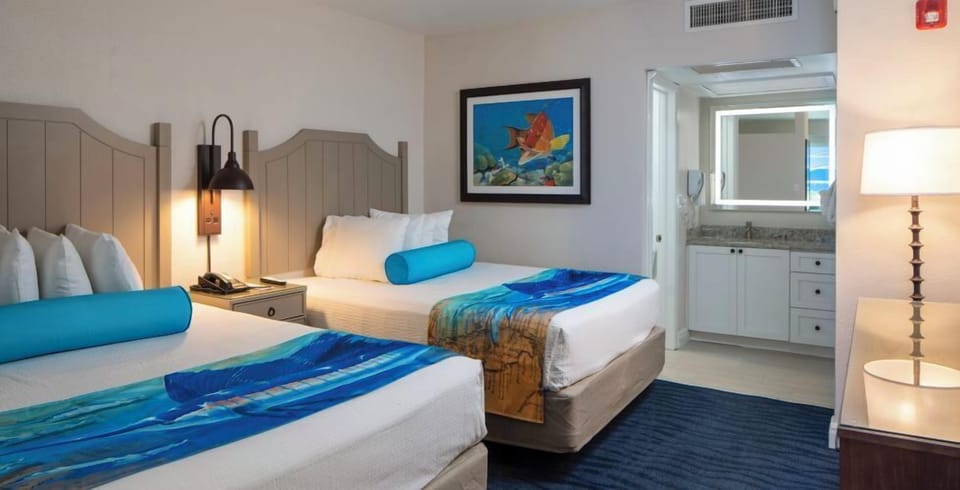 Recharge in a refreshed room with bright, modern finishes.