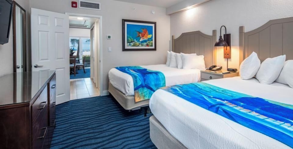 Settle into a spacious room with two inviting queen beds.