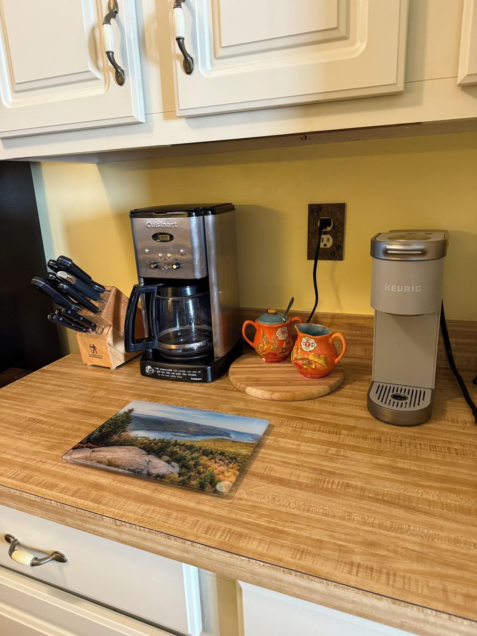Coffee area in kitchen with coffee maker and Kuerig