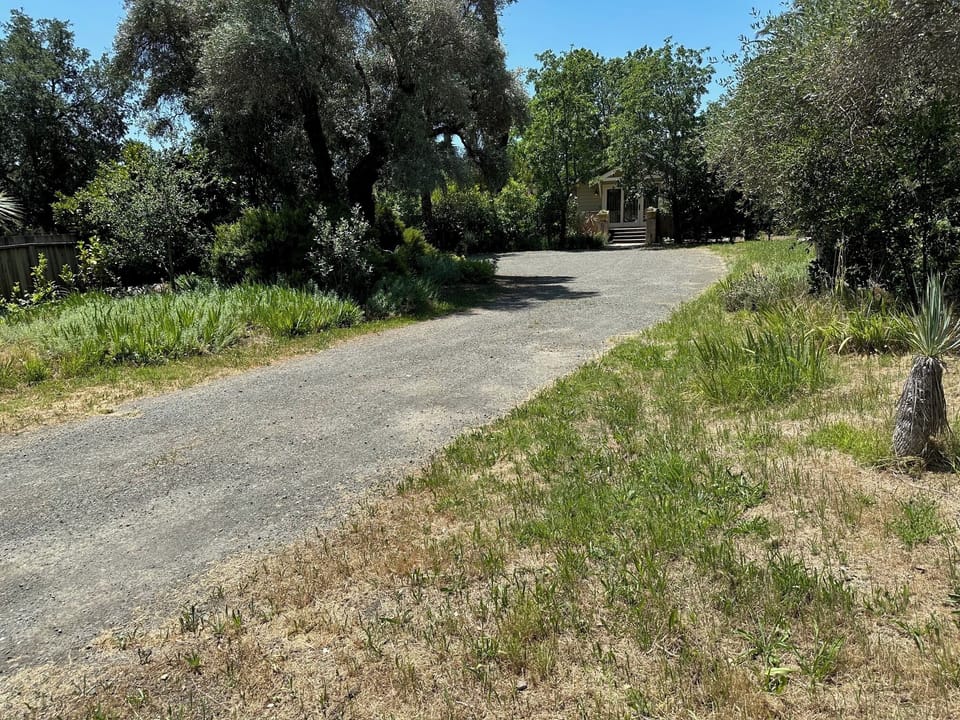A long, private driveway leads you to the quiet and secluded home. 