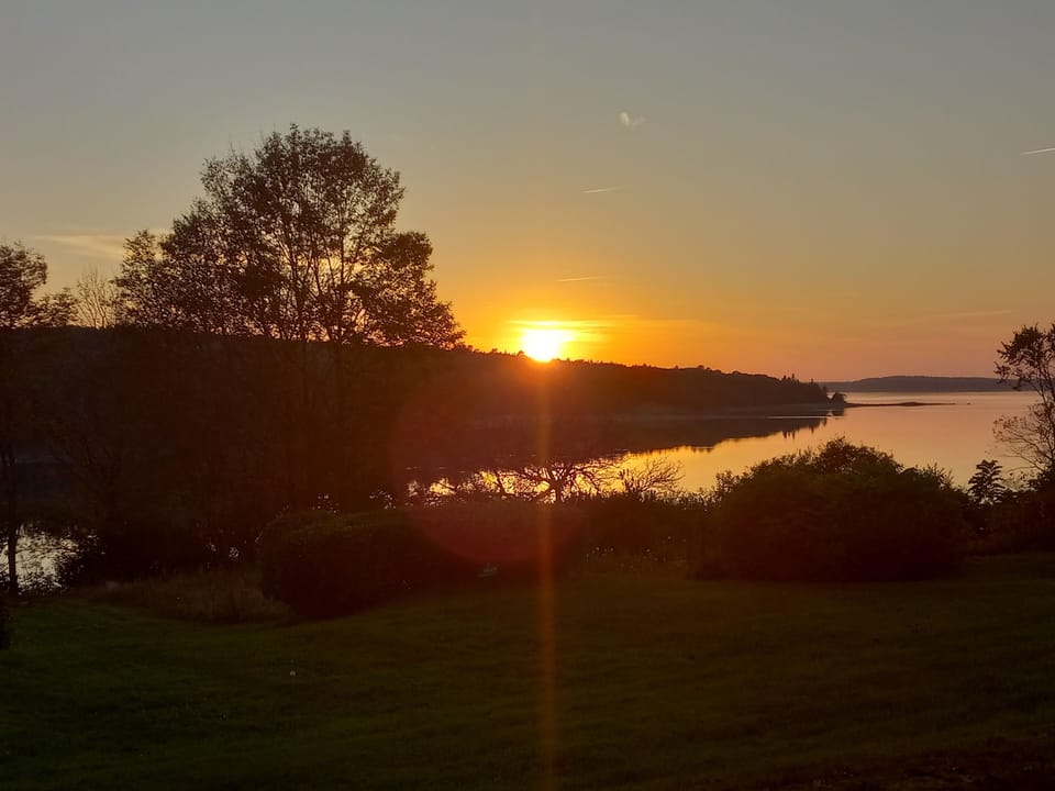 sunset over Jones Cove, across from driveway