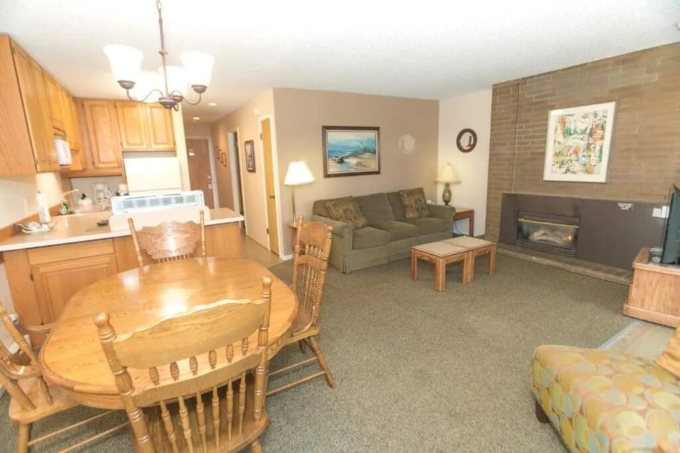 Step out to fresh air from the open, connected living space.