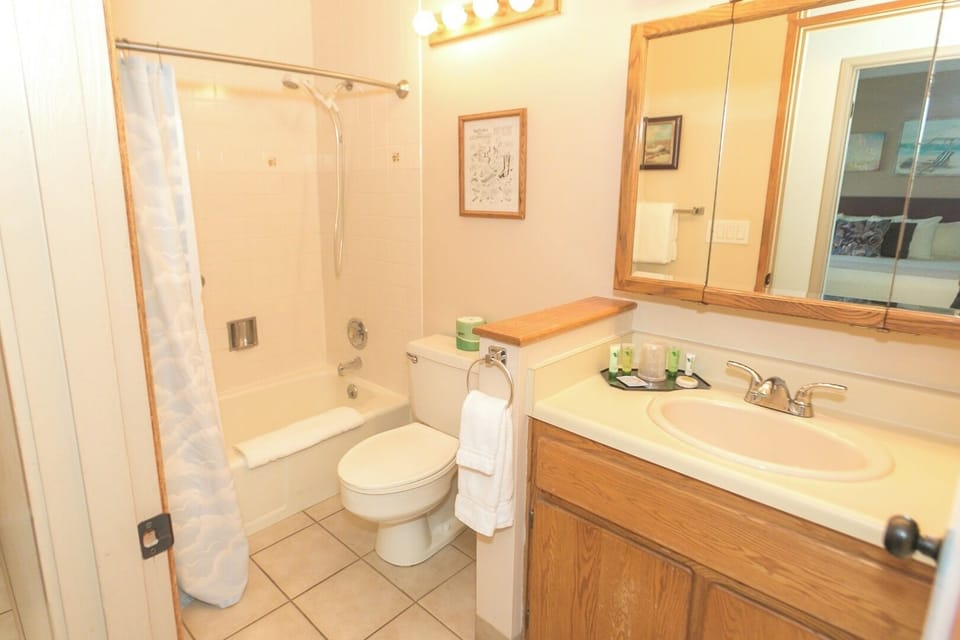 Freshen up with a bright vanity and a soothing shower.