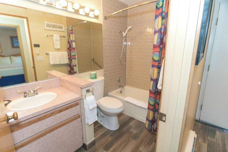 Refresh with a bright vanity and shower-tub combo.