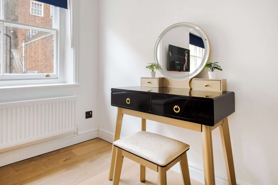 Bedroom 1 | Features a super king-size bed with a 50-inch TV perfectly positioned opposite, all enhanced by full air conditioning to ensure your comfort throughout your stay.
