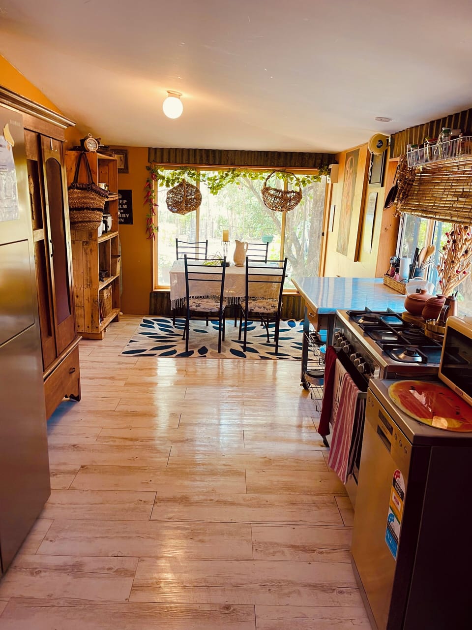 Spacious eat in kitchen with 5 burner chefs stove and 2 door fridge freezer