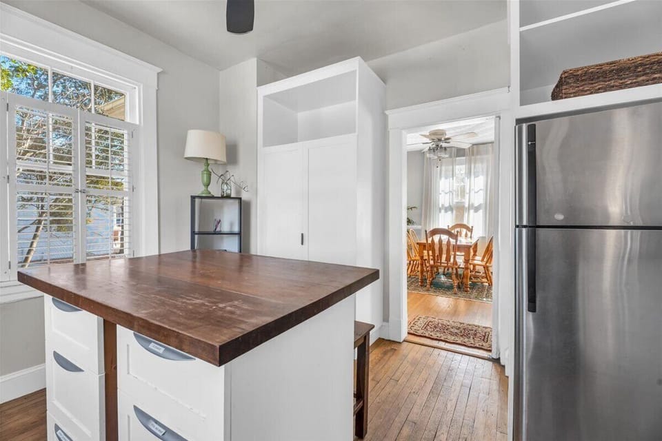 Kitchen: Modern island blending functionality with rustic charm, perfect for culinary adventures!