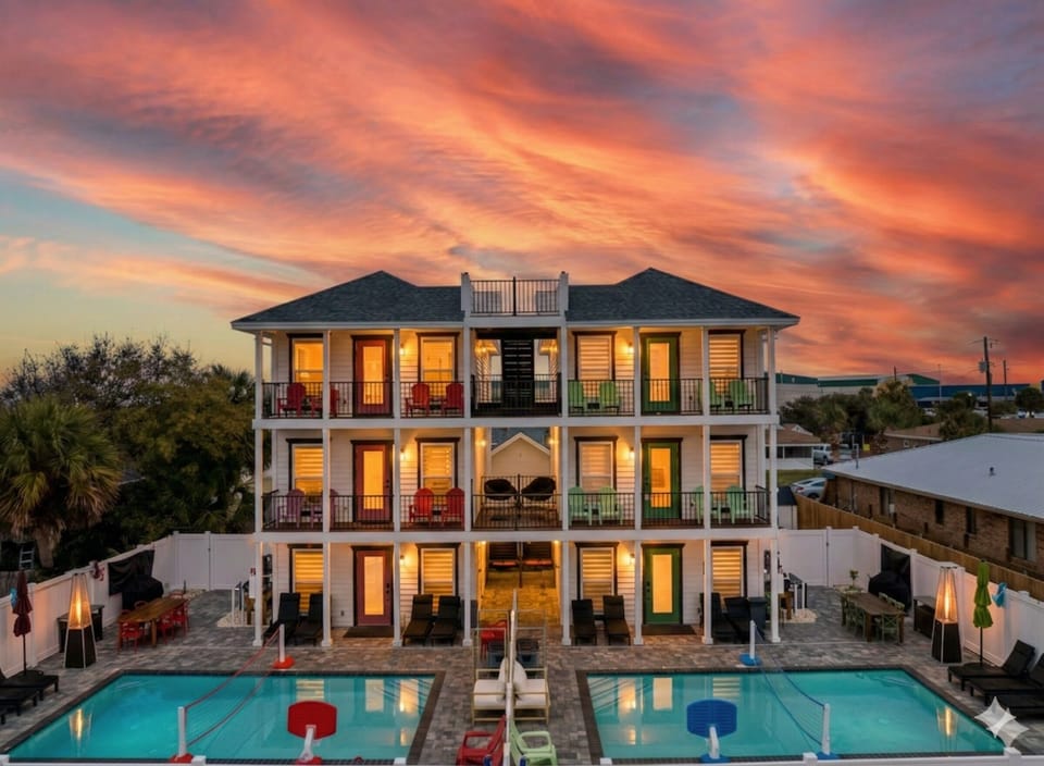 Two side-by-side beach homes (One in a Melon [left home] + Sublime [right home])