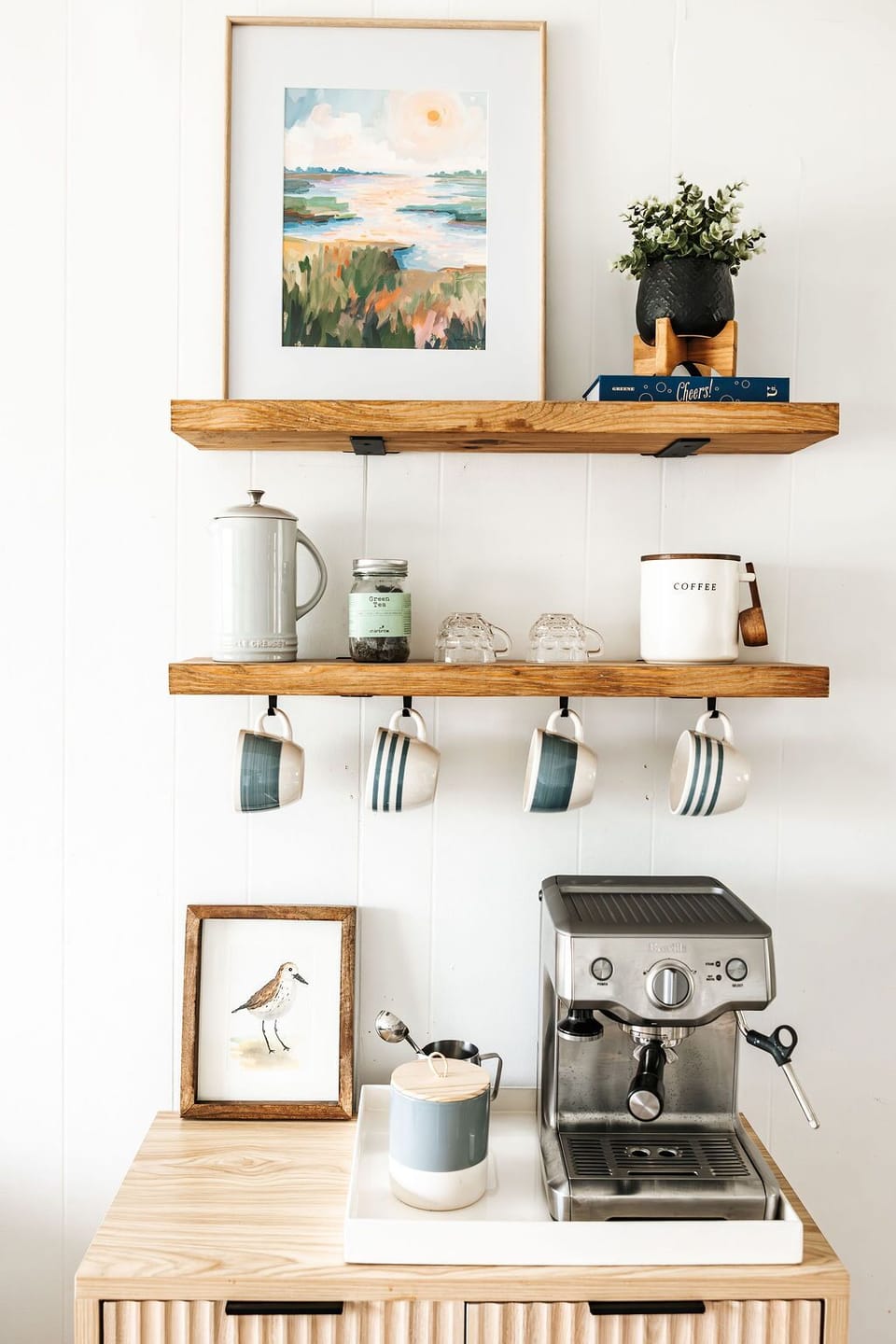 Fully stocked coffee bar featuring Breville Espresso maker