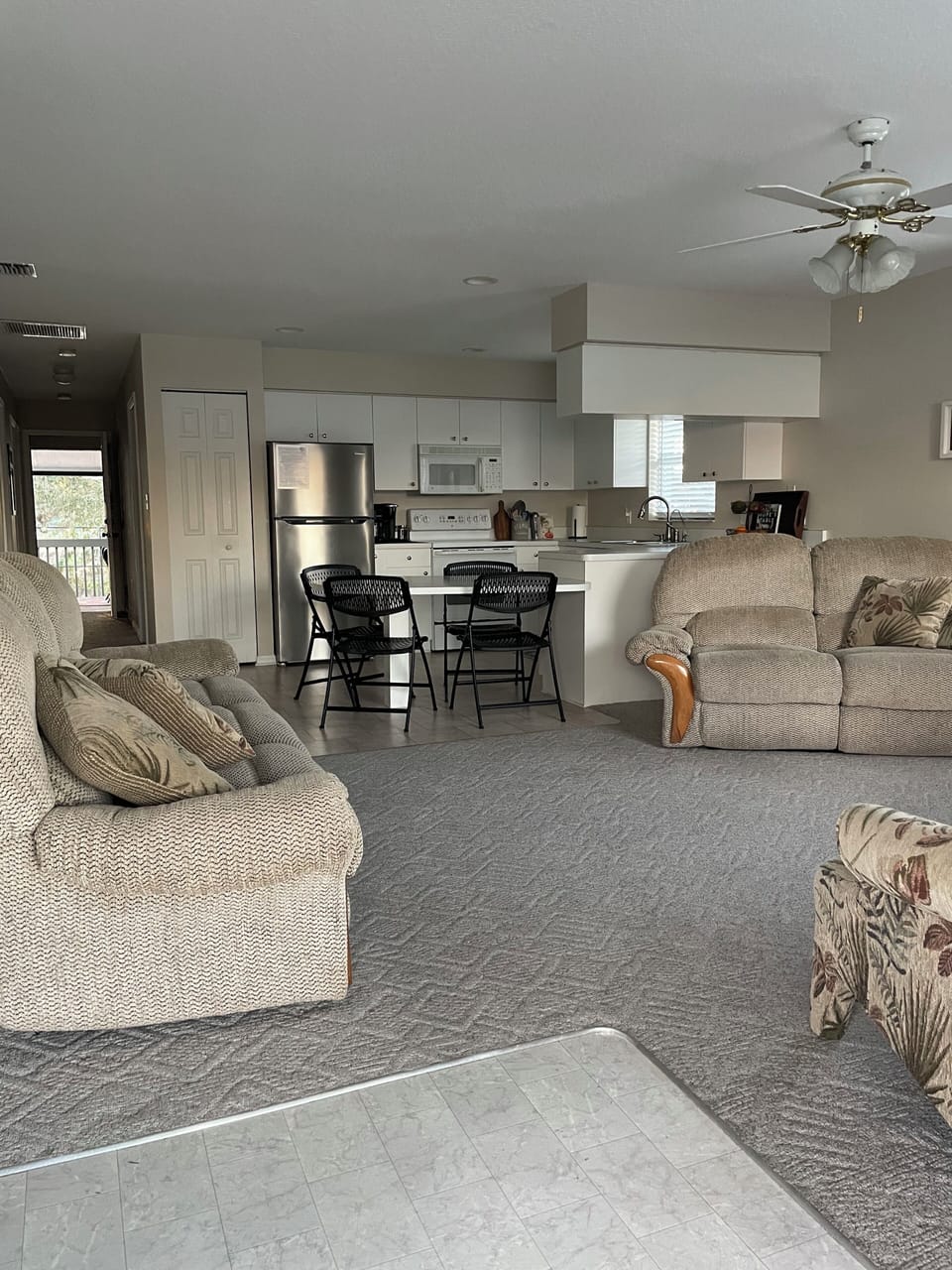 Looking into Living Room and Kitchen from front door