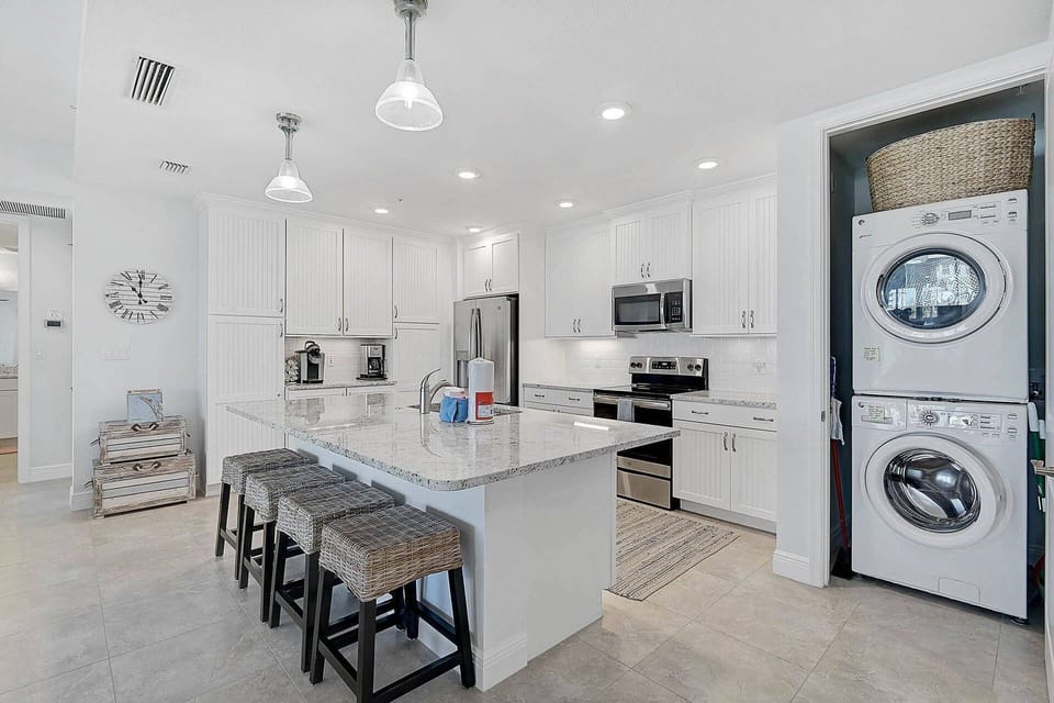 Kitchen is equipped with all your needs including a coffee bar