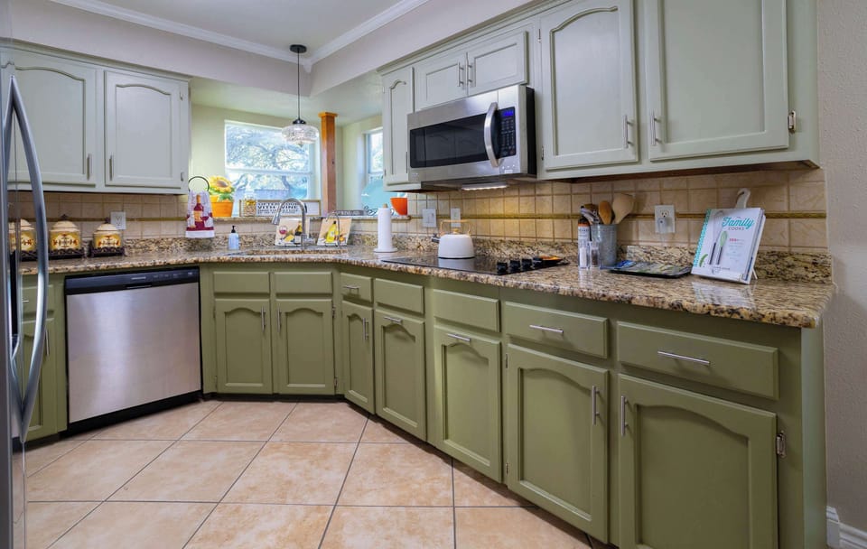 The open kitchen offers ample space & all the comforts of home