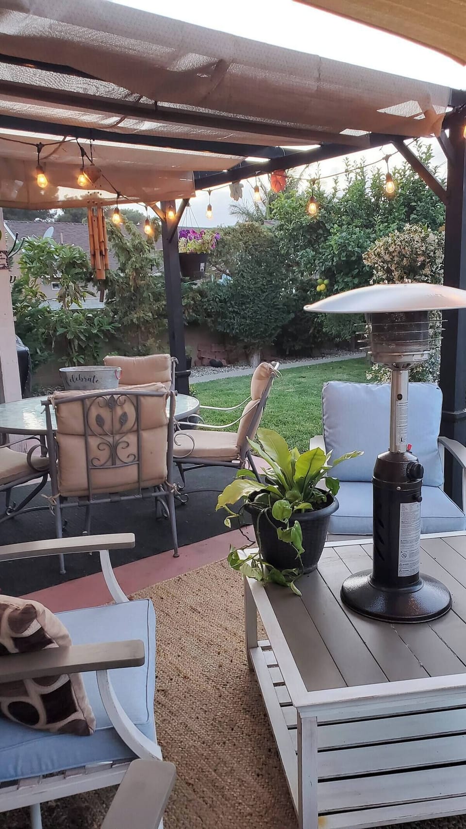 At sunset, unwind on the patio by the pool and enjoy a glass of wine by the fire