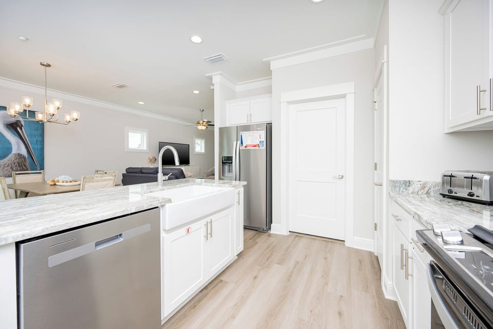 This modern kitchen offers plenty of appliances and additions for a relaxing and enjoyable stay