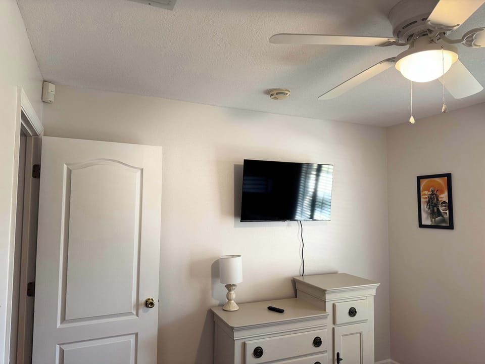 Fourth bedroom with TV