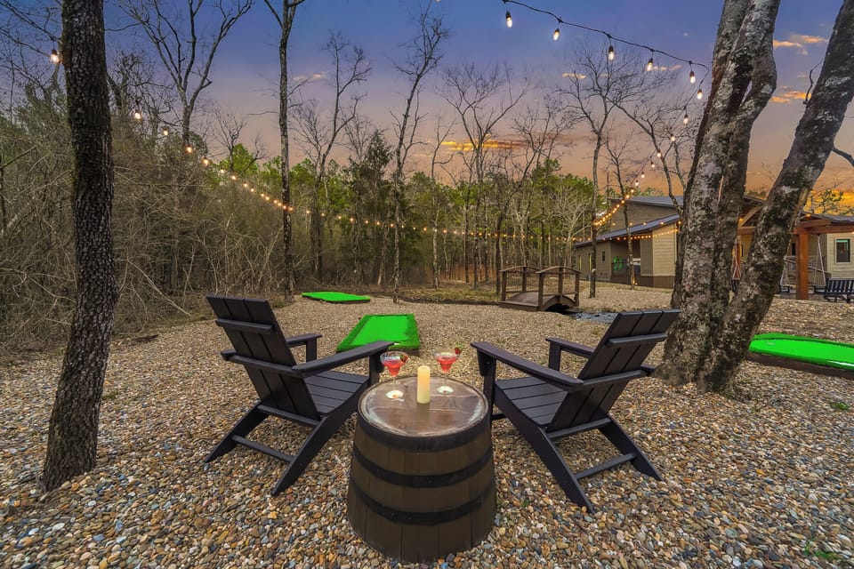 Have a blast in our outdoor mini golf area, featuring a delightful bridge over a peaceful creek. It's the perfect spot for family fun, laughter, and making beautiful memories together in natur