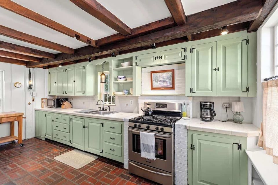 Lovingly restored kitchen with plenty of counterspace for meal prep