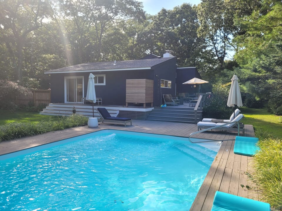 Master Bedroom deck and outdoor shower from pool