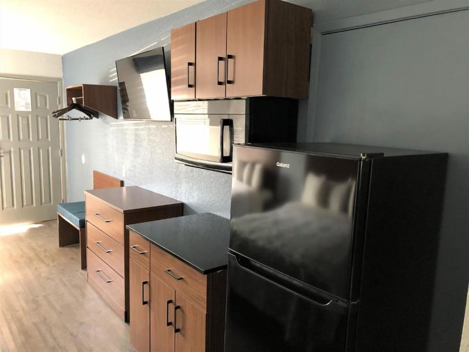 Set up your stay with convenient fridge, microwave, and storage.
