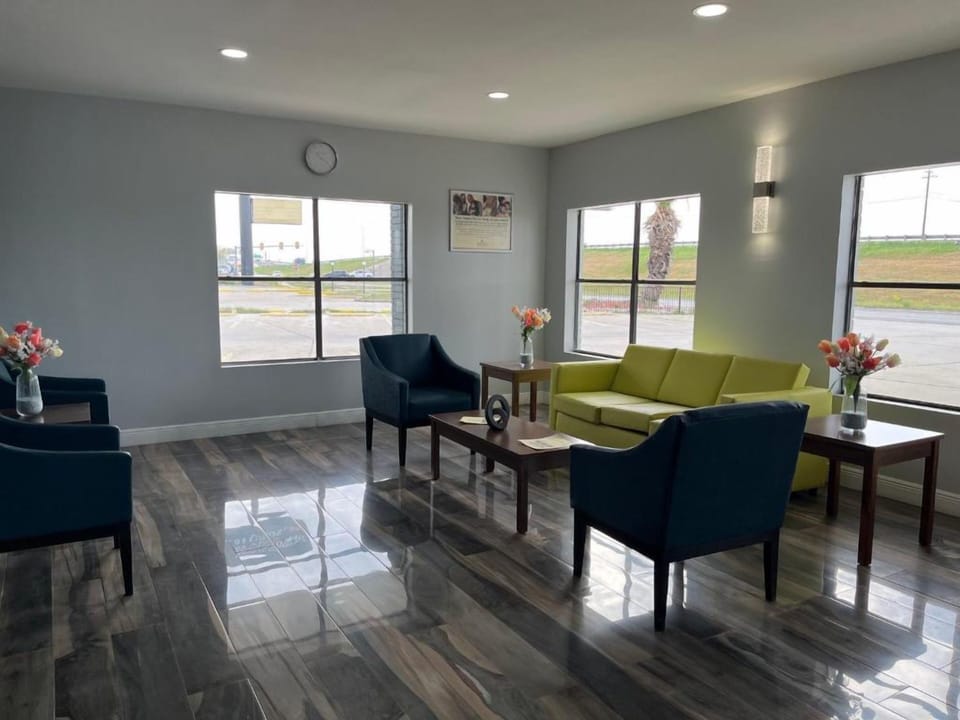Unwind in the bright lounge with comfortable seating and daylight.