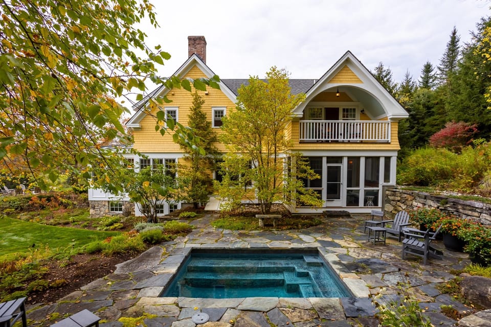back of house and pool/ screened in deck 