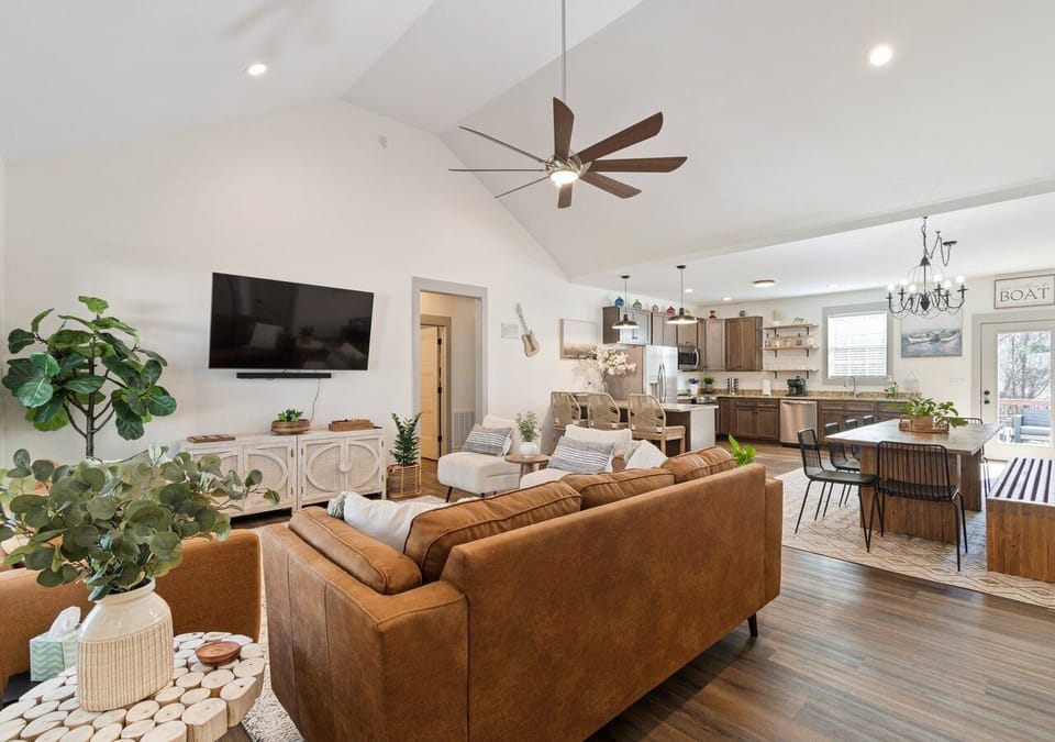 Open concept with living room, kitchen, and dining area