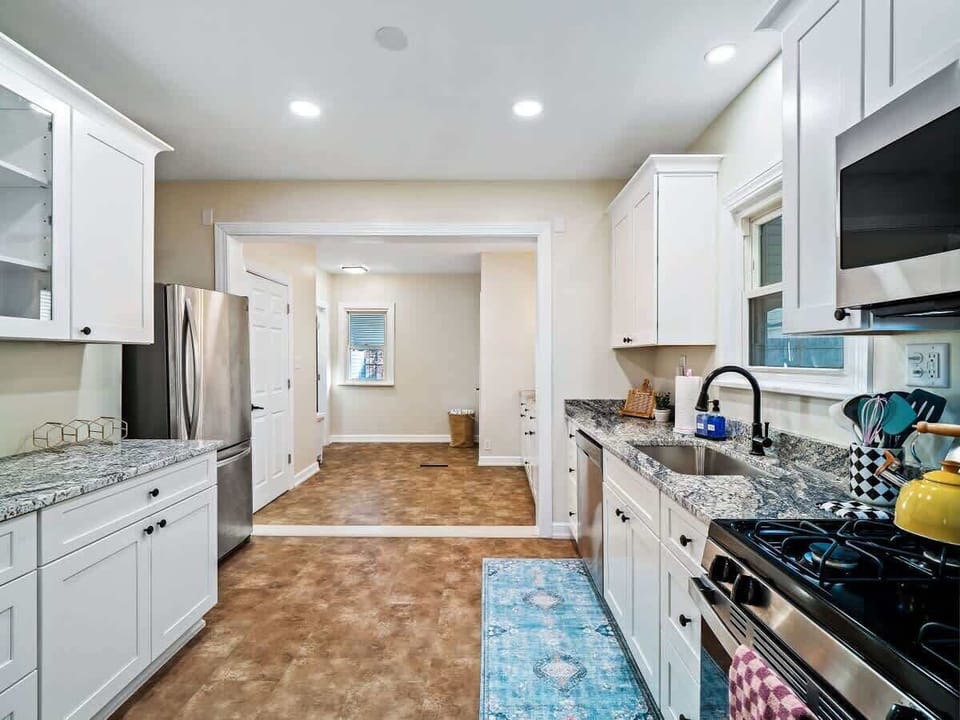 Long, bright kitchen w/ ample counter space & room to cook comfortably