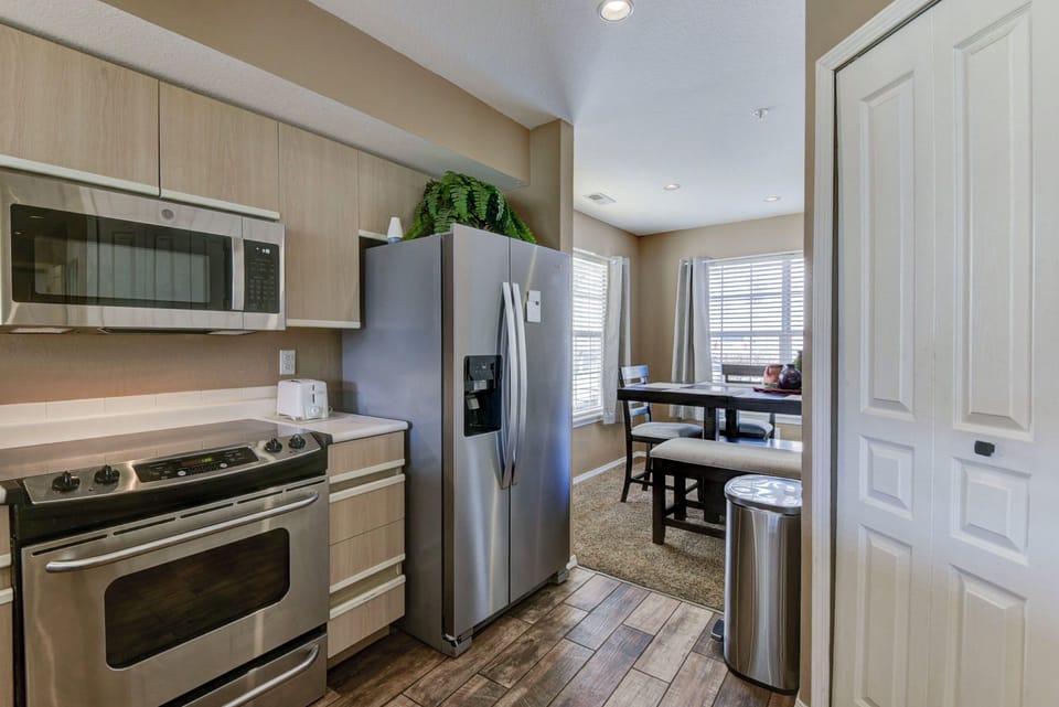 New appliances - kitchen leading into dining area